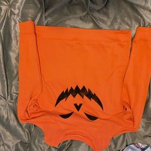 Pumpkin face off shoulder sweater